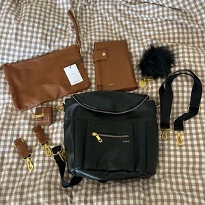 Fawn Design Black Leather Convertible Backpack with Brown Accessories